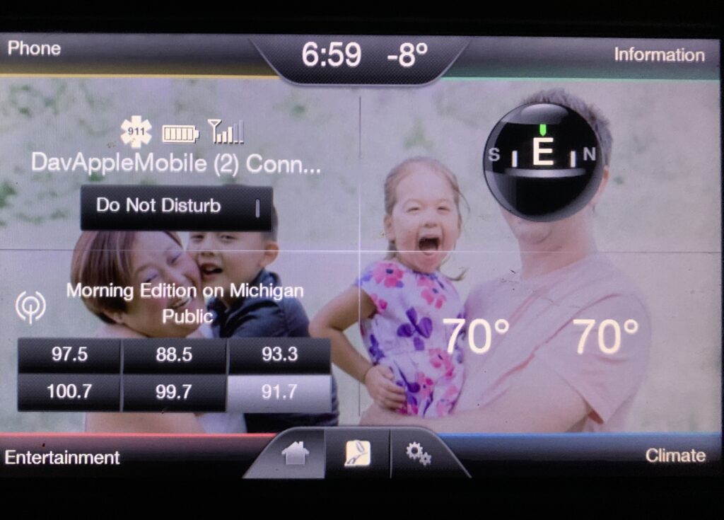 Photo of my car's infotainment screen with a temperature reading "-8 degrees".